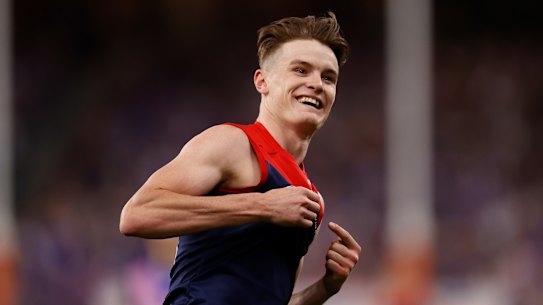 On fire: Bayley Fritsch celebrates his fifth goal during the AFL grand final. 