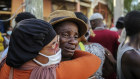 People cry during the search for those who are still missing after Haiti’s latest earthquake. 