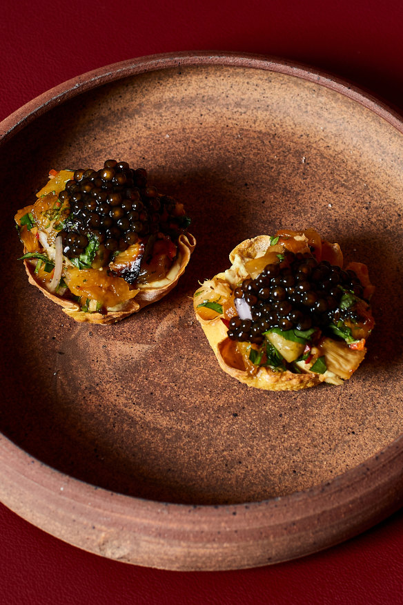Selat Lumpia smoked pineapple, spiced coconut, caviar.