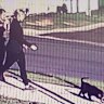 The CCTV image posted to Facebook showing two women walking with a small black dog.