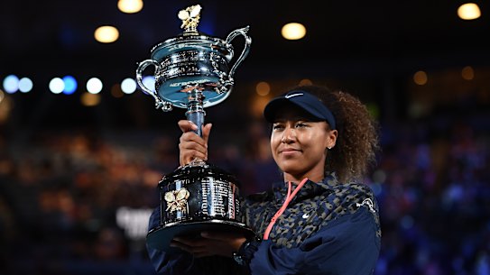 Naomi Osaka with the trophy after her victory over Jennifer Brady in the women’s final.