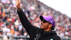 Lewis Hamilton waves to fans during the drivers parade before the F1 Grand Prix of Japan at Suzuka.