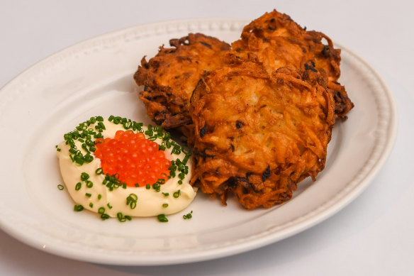 Potato roesti patties with creme fraiche and trout roe.