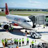 Jetstar flight JQ362 on the tarmac moments before it is pushed back for the first flight.