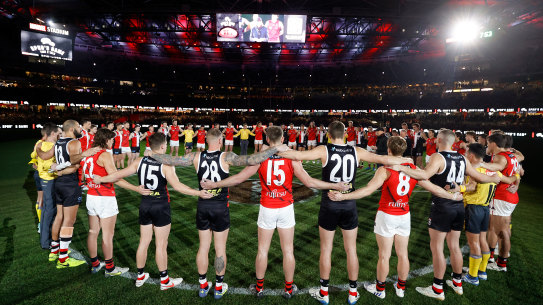 Players, coaches, and umpires will come together pre-game across the round of AFL matches this weekend.