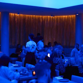 The ceiling is equipped with colour-changing LED lights.