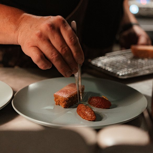 Chef Derek Boath works solo in the Underbar kitchen.
