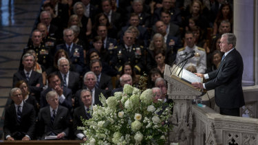 Former US president George W. Bush speaks during the memorial service for late Senator John McCain at Washington National Cathedral in Washington, DC,  on Saturday.