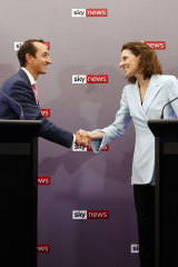 Liberal MP Dave Sharma and independent rival Allegra Spender shake hands at this week’s debate in the seat of Wentworth.