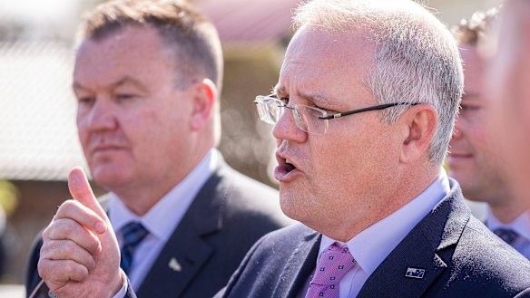 Prime Minister Scott Morrison faces the media at Leawarra Railway station in Frankston, Melbourne, on Friday.