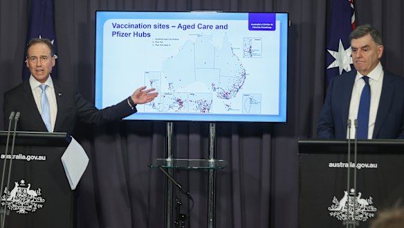 Let the rollout begin: Minister for Health Greg Hunt and Secretary of the Department of Health Professor Brendan Murphy during a press conference on the COVID-19 vaccine rollout on Thursday. 