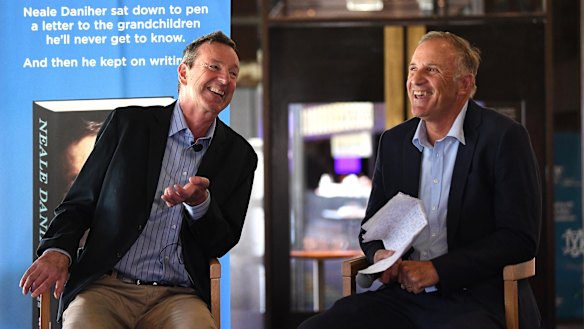 Neale Daniher with MC Tim Watson.