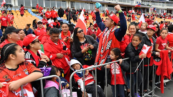 Red and white fever: Tonga fans turn out to support their team at a fan day in Auckland.