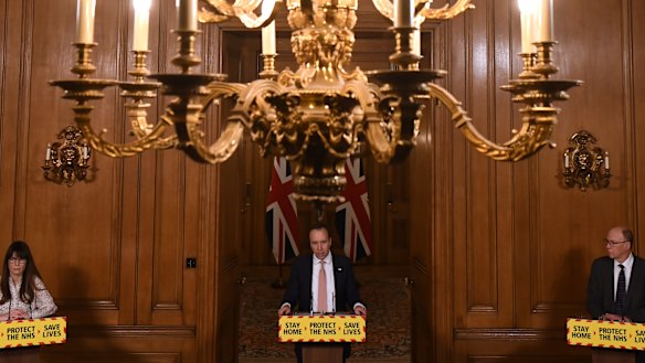 Healthcare Epidemiologist Consultant Susan Hopkins, British Health Secretary Matt Hancock and NHS England National Medical Director Stephen Powis speak.