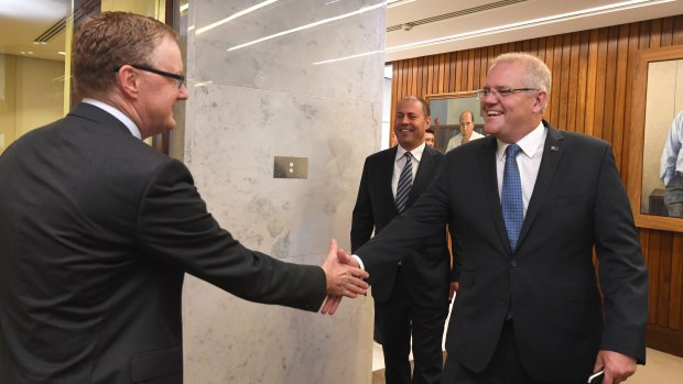 The PM and the Treasurer meet the governor of the Reserve Bank.