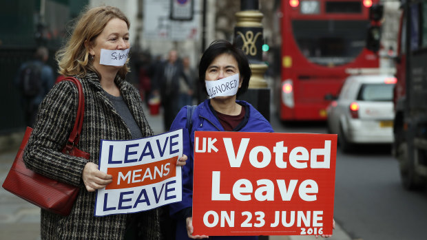 Pro-Brexit demonstrators outside the Houses of Parliament in London.