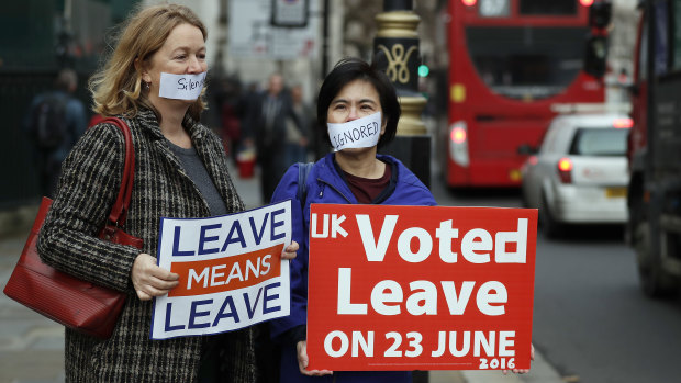 Pro-Brexit demonstrators outside the Houses of Parliament in London.