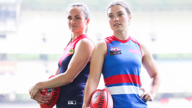 Melbourne captain Daisy Pearce and Western Bulldogs counterpart Ellie Blackburn at Marvel Stadium ahead of the new AFLW season.
