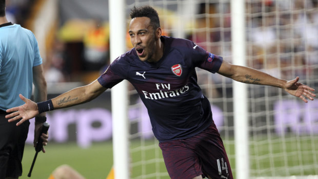 Arsenal's Pierre-Emerick Aubameyang celebrates the Gunners' third goal.