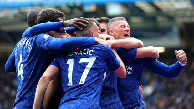 Chelsea celebrate Marcos Alonso's goal against Tottenham Hotspur at Stamford Bridge.
