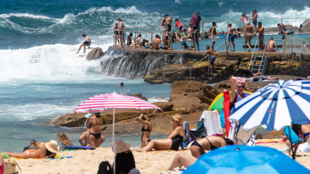 Crowds gathered at Bronte Beach on Friday as huge surf battered the ocean pool.