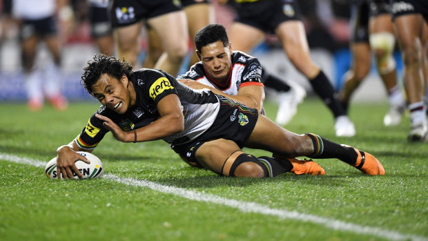 Rising star: Jarome Luai cuts through the Warriors' defence to punctuate a breakout performance for the Panthers.