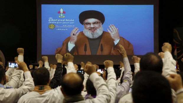 Hezbollah leader Hassan Nasrallah, via a video link seen in southern Beirut, Lebanon.