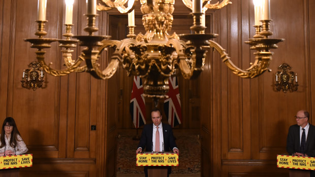 Healthcare Epidemiologist Consultant Susan Hopkins, British Health Secretary Matt Hancock and NHS England National Medical Director Stephen Powis speak.