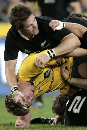 Upper hand: Richie McCaw and Michael Hooper go head to head in 2013.