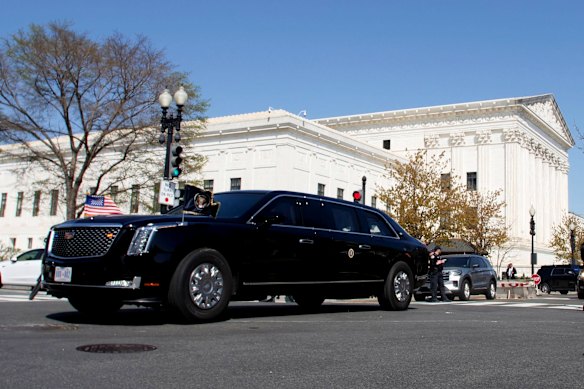 The Beast, carrying Donald Trump, departs the Supreme Court. He became the first sitting US president to attend such a hearing.