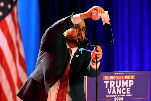 Gabriel Perez clears a teleprompter for Trump in 2024.
