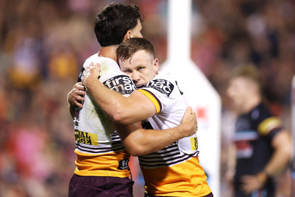 Broncos players Herbie Farnworth and Billy Walters celebrate after a shock win over the Penrith Panthers  in round one this year.