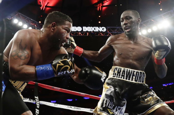Terence Crawford, right, looms large for Tim Tszyu should he emerge victorious in Vegas on Sunday.