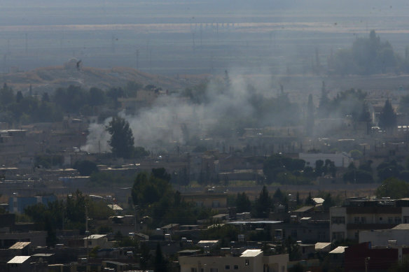 Plumes of smoke could be seen rising from Ras al-Ayn in Syria.