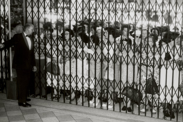 Shoppers wait for the doors to open at the Myer Boxing Day sale in Melbourne in 1958.