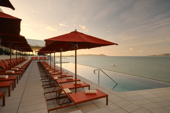 Ardo’s rooftop pool and bar look across to the Coral Sea and Magnetic Island.