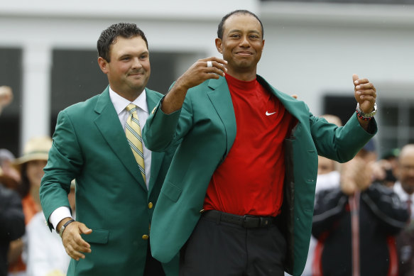 Tiger Woods dons his fifth green jacket following his remarkable win at Augusta National last year.