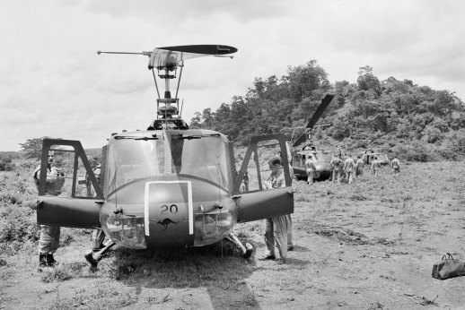 Iroquois helicopters on the pad at 1ATF HQ ready for a troop support mission, August 1966.