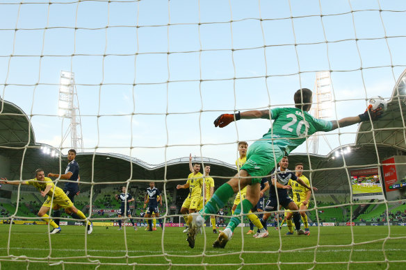 Rudy Gestede heads the ball into the net.