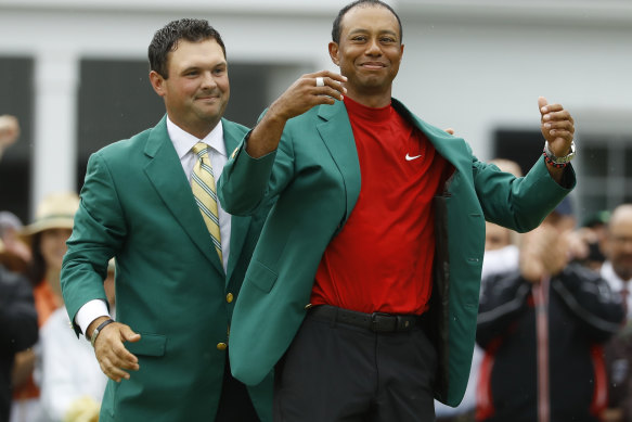 Tiger Woods dons his fifth green jacket following his remarkable win at Augusta National last year.