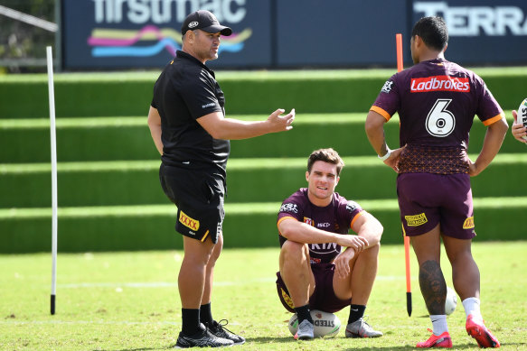 Broncos coach Anthony Seibold (left), Brodie Croft (centre) and Anthony Milford (right) during Brisbane Broncos training at Clive Berghofer Field on Tuesday.