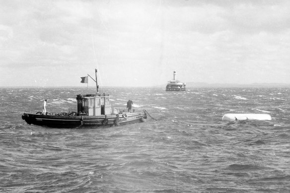 Harbour Trust boat “Versatile” searches for survivors of the sinking of the tug boat “Melbourne” in 1972.