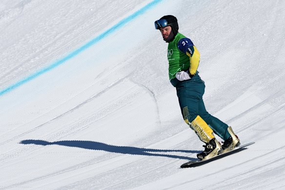 Adam Lambert heads towards the finish line after his crash in the men’s section of the final.