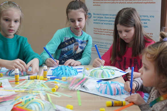 Children doing art therapy in Kyiv, Ukraine.