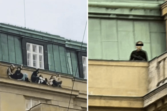 Students hide from the shooter on the ledge of one of the university buildings in Prague.