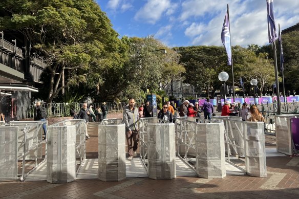 The temporary barriers erected on the western side of Circular Quay train station, with the lighter barricades along the path seen in the background.