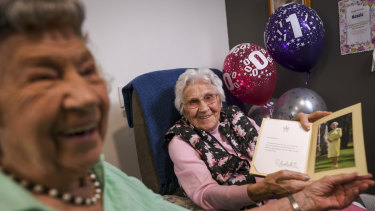 Happy 110th birthday: Agnes 'Nessie' Kluckhenn, right, and her 'baby' sister Williamina, 95. 