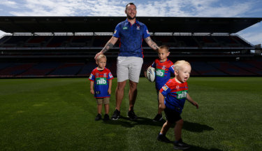 King of the kids: Even when the Knights unveiled David Klemmer as their new signing, sons Jackson (left), Cooper (right) and DJ (running off) stole the show.