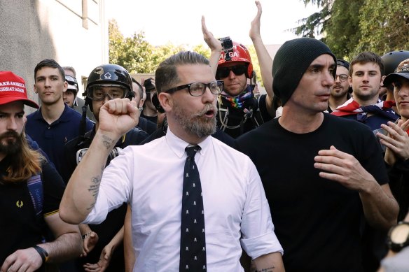 Gavin McInnes, pictured centre. 