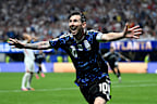 ATLANTA, GEORGIA - JULY 15: Lionel Messi #10 of Argentina celebrates the team’s second goal by Lautaro Martinez #22 during the FIFA World Cup 2026 Semi Final match between England and Argentina at Atlanta Stadium on July 15, 2026 in Atlanta, Georgia. (Photo by Shaun Botterill/Getty Images)